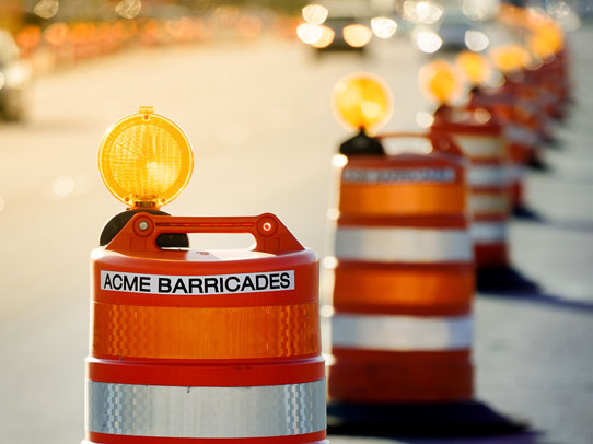 Acme Barricades orange barrels used as temporary traffic control in Florida