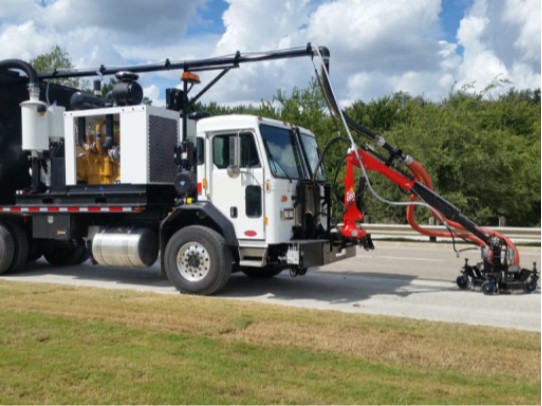 Waterblasting pavement before a roadway project