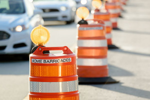 Acme Barricades orange barrels used as temporary traffic control in Jacksonville